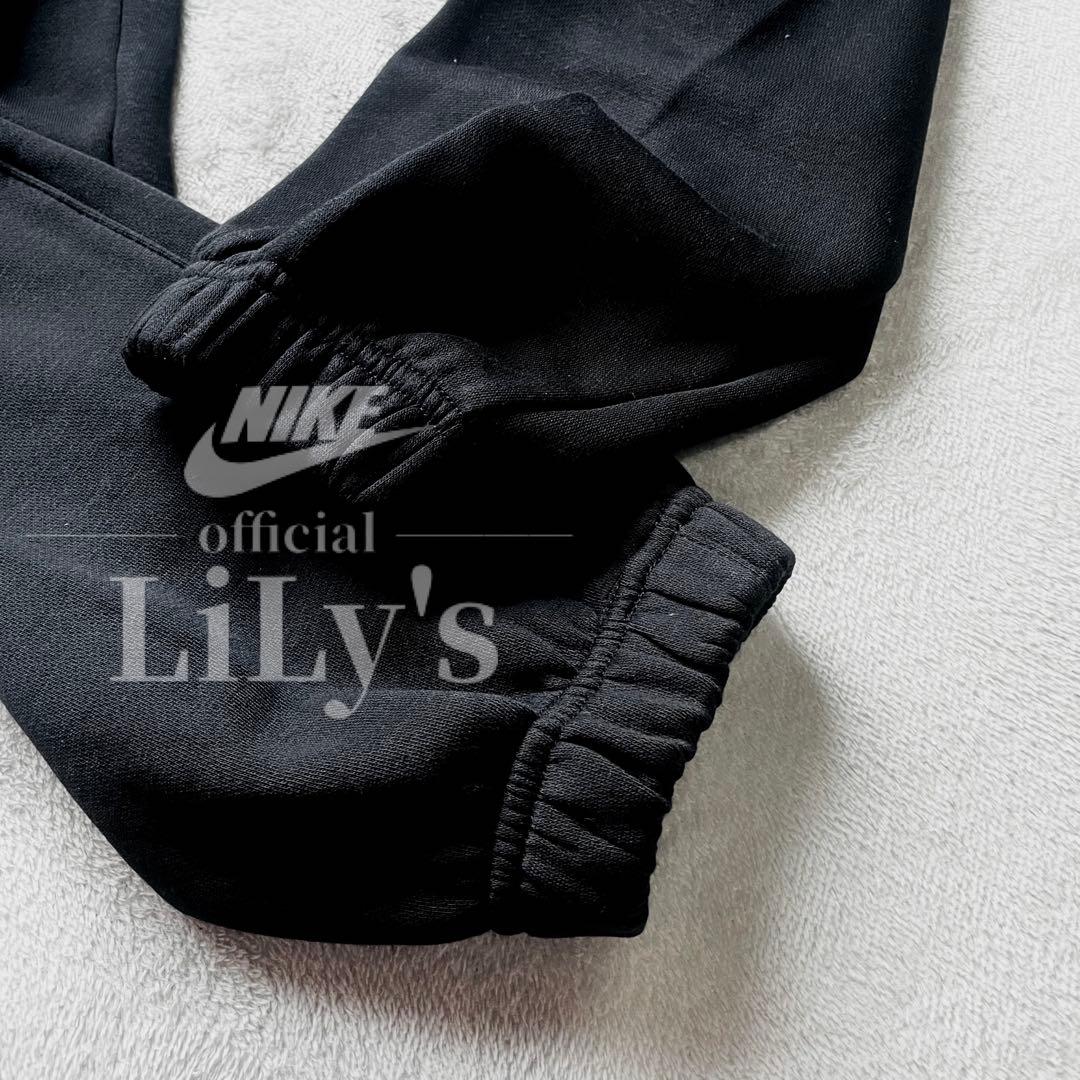 【Ｍサイズ】新品未使用　ナイキ上下セットアップ　ブラック✖︎オレンジ　黒　ロゴ刺繍