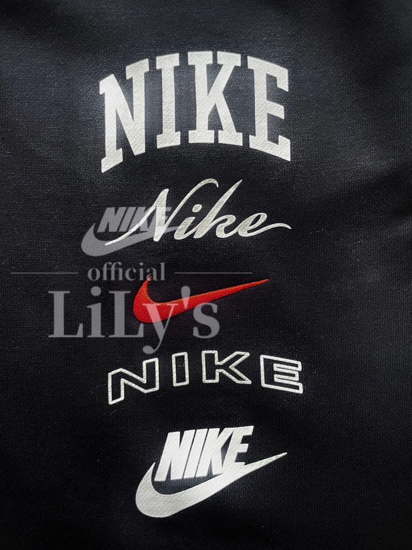 【Ｍサイズ】新品未使用　ナイキ上下セットアップ　ブラック✖︎オレンジ　黒　ロゴ刺繍