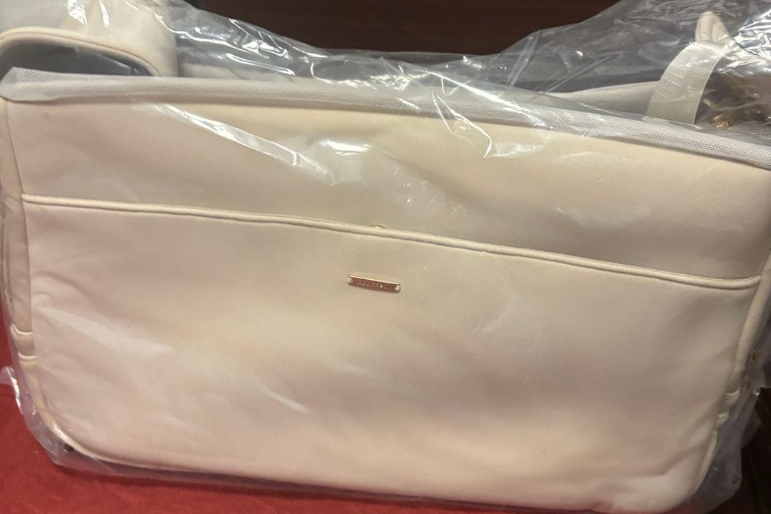 モンシェリ　ネオプレンスリングバッグ