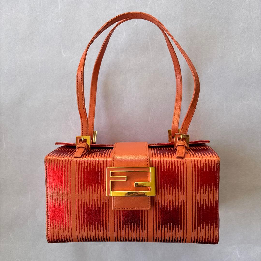 たく FENDIオレンジ ストライプ パーティーバッグ
