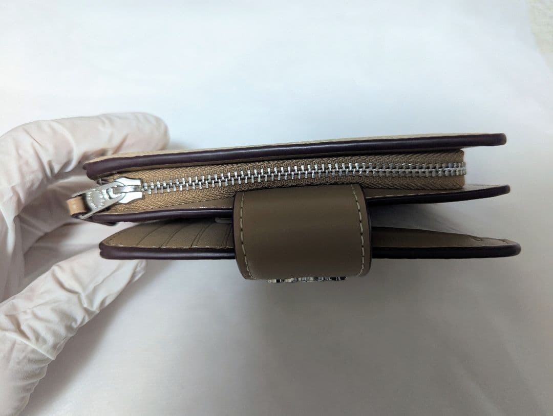 COACH 二つ折り財布 シグネチャー柄 ベージュ CW786