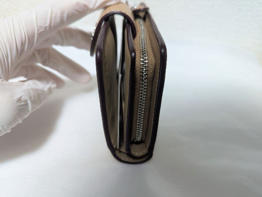 COACH 二つ折り財布 シグネチャー柄 ベージュ CW786