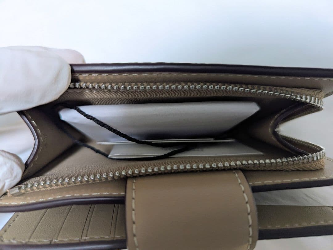 COACH 二つ折り財布 シグネチャー柄 ベージュ CW786