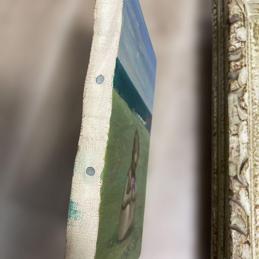 海辺の少女の油彩画