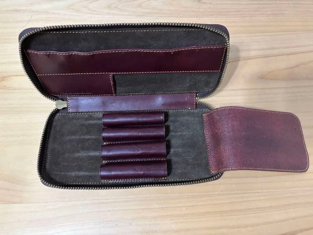 バハギア ラウンドジップペンケース モスト