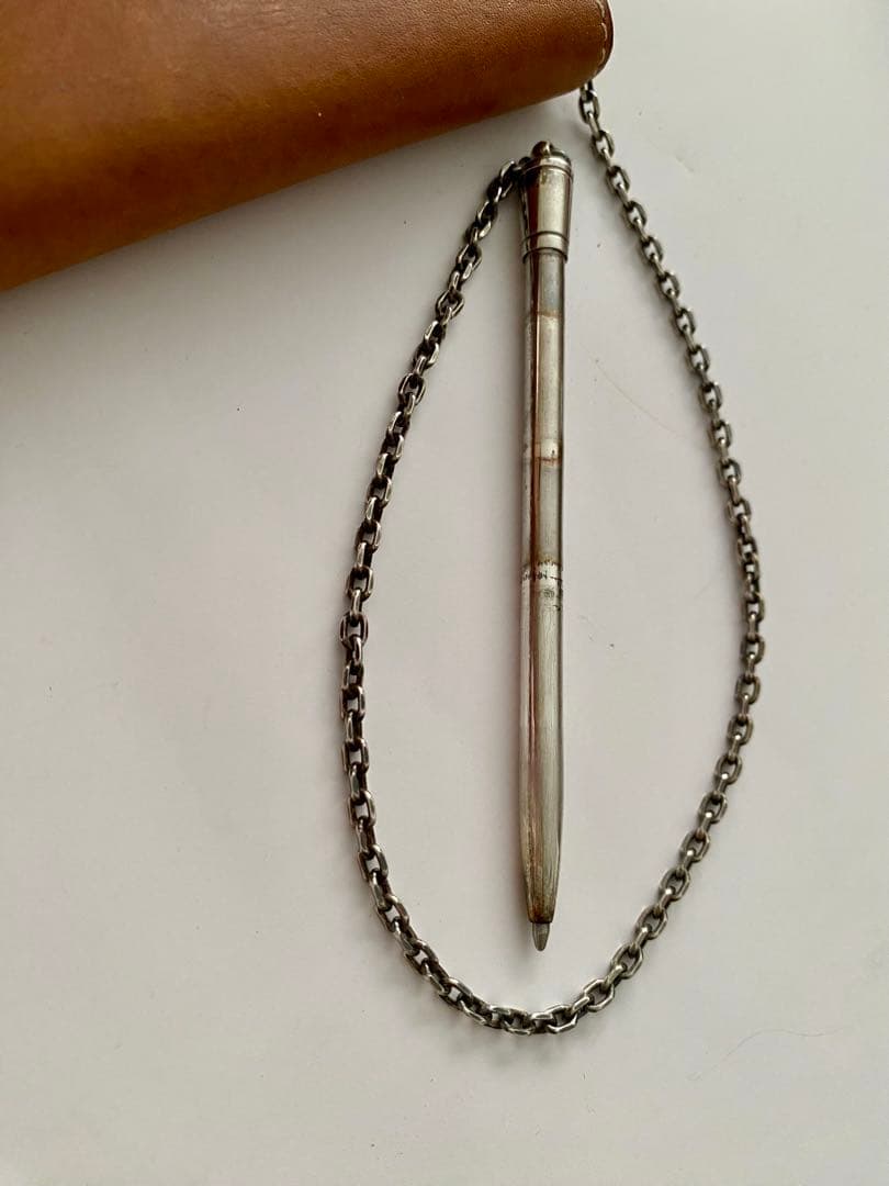 エルメス茶色い革手帳ボールペン付き