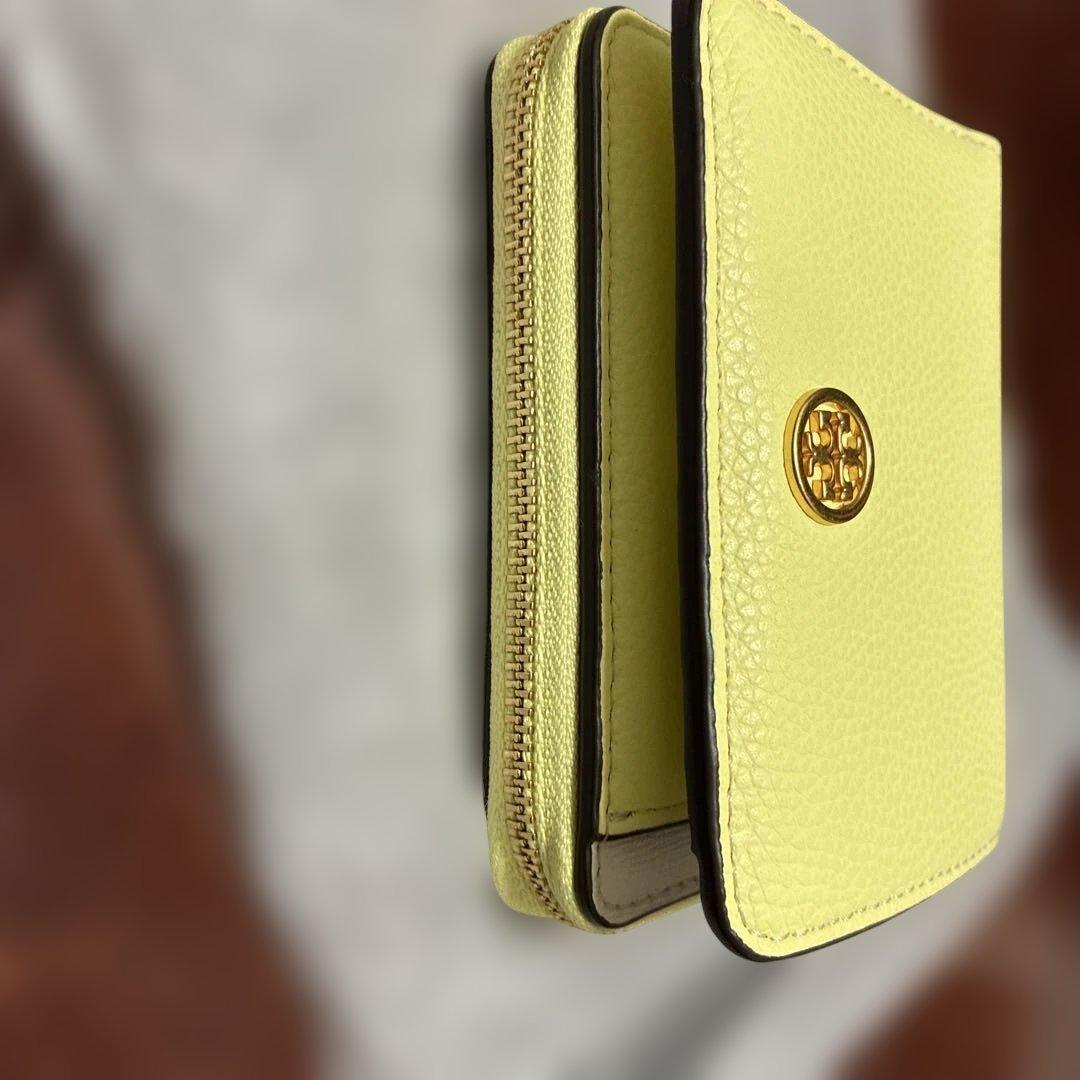 トリーバーチ　イエロー レザー 二つ折り財布