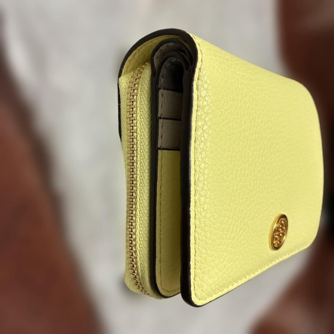トリーバーチ　イエロー レザー 二つ折り財布