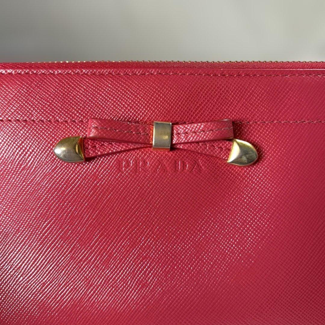 【sk/7.20/30】PRADA ピンク 二つ折り財布 リボン付き