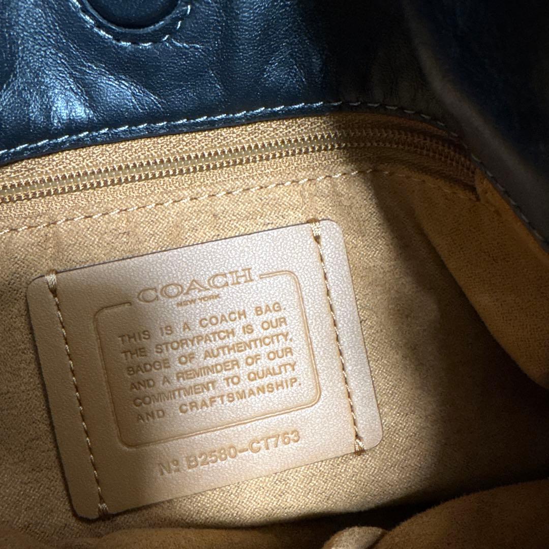 コーチ　フェイ ドローストリング バッグ
