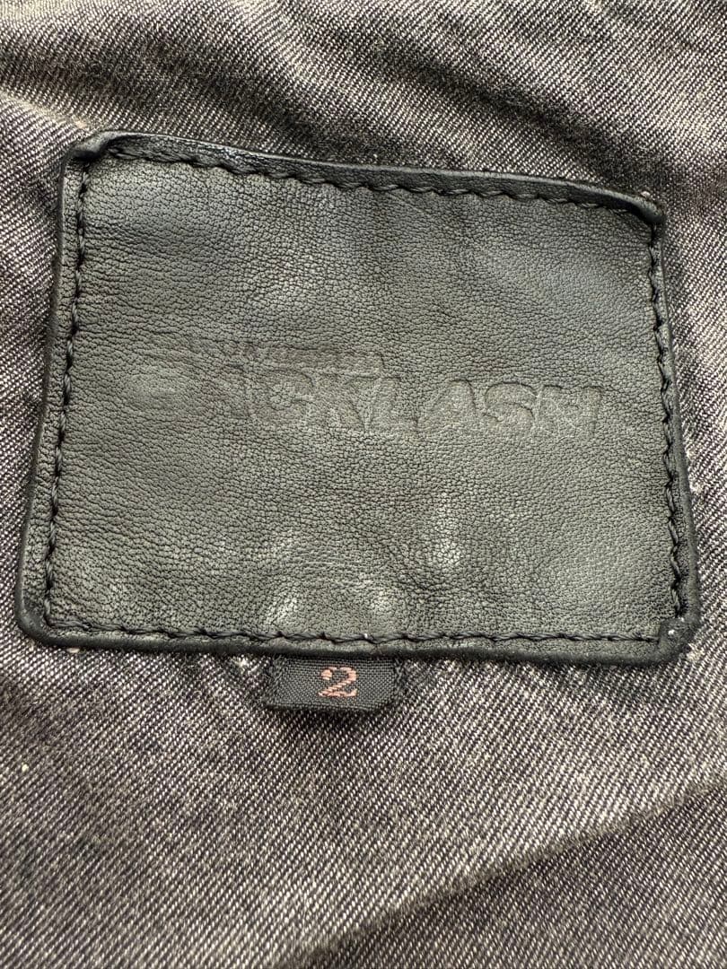 バックラッシュ ポーランドショルダー シングルライダースジャケット