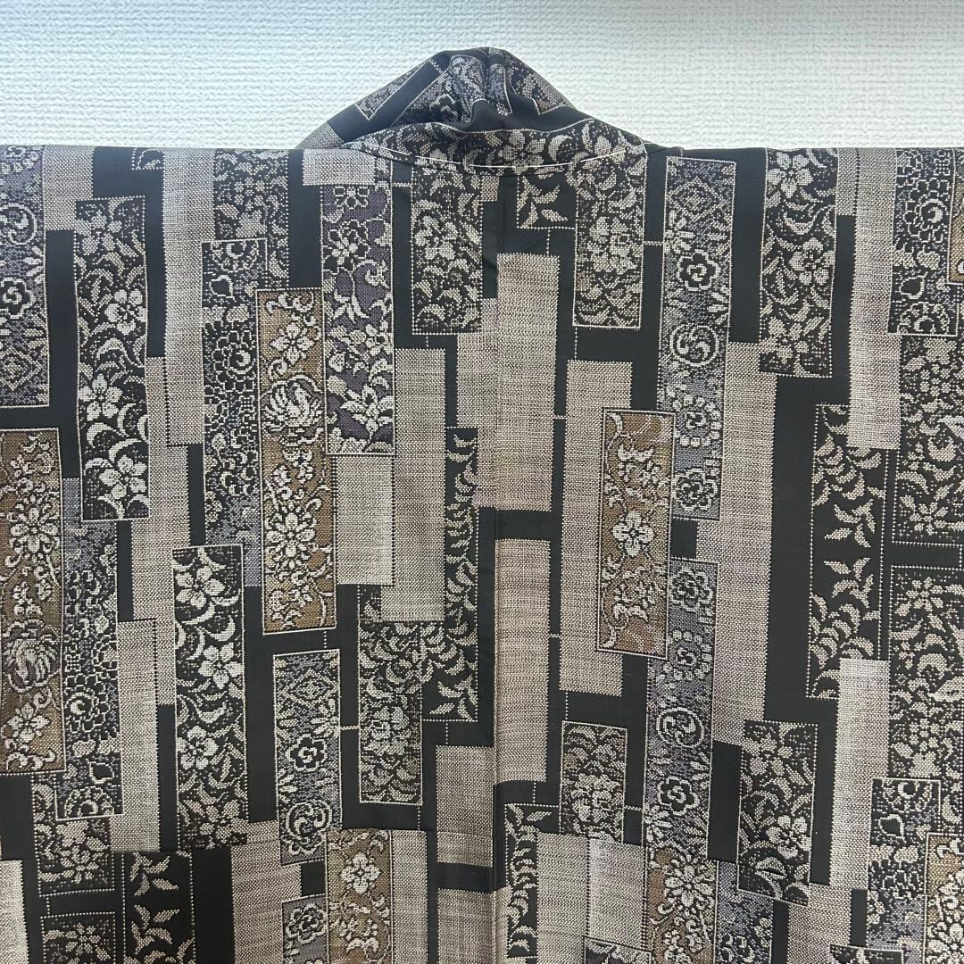 未使用品　細かな絣り！　モダン　花更紗柄　本場泥大島紬　９マルキ　着物　５１８