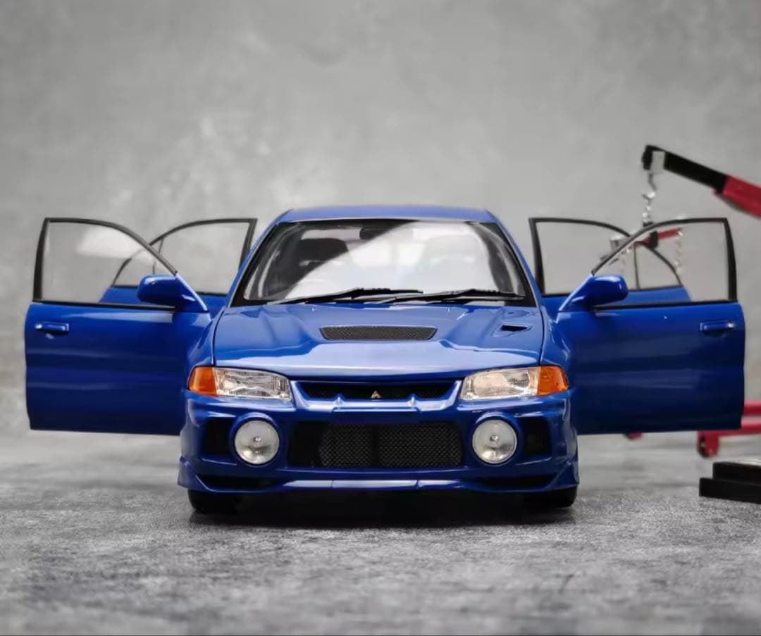 1:18 Mitsubishi Lancer Evolution IVミニカー