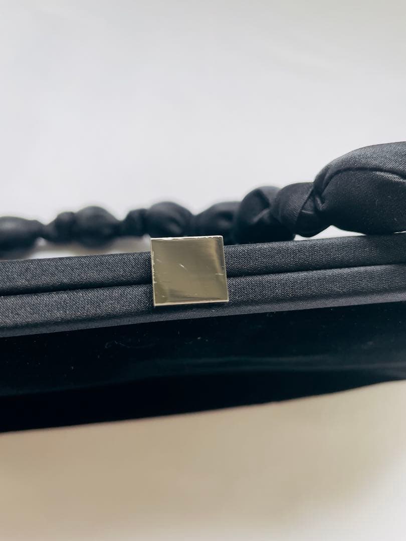 お値下げ。FOXEY ブラック クラッチバッグ