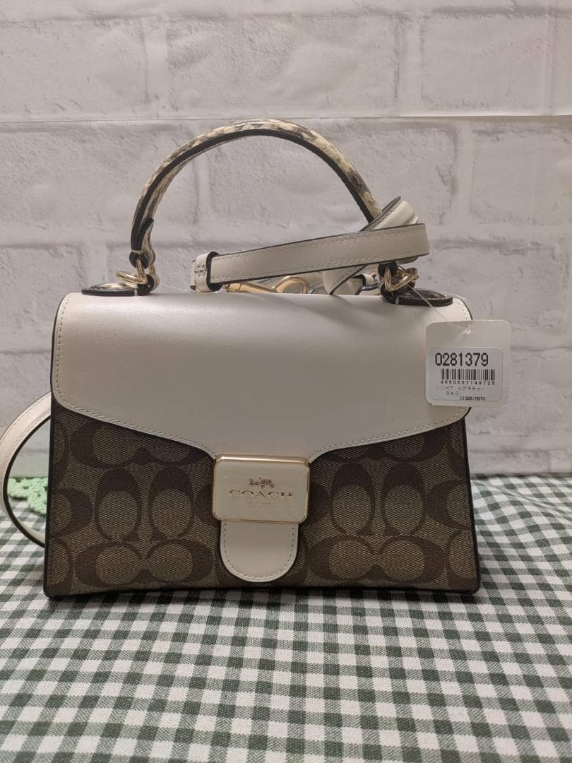 コーチ　 ショルダーバッグ　 ペッパー サッチェル シグネチャー キャンバス