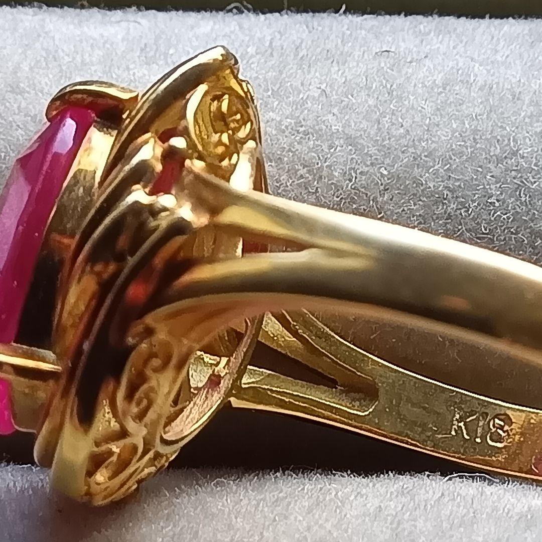 ピンク色おたからや聞くルビーかストーンリングK１８内径約１６mm重量合計４.５g