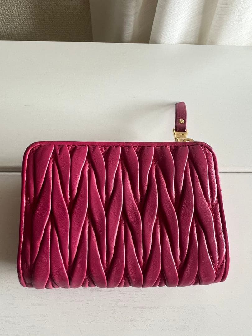 miu miu ピンク 二つ折り財布