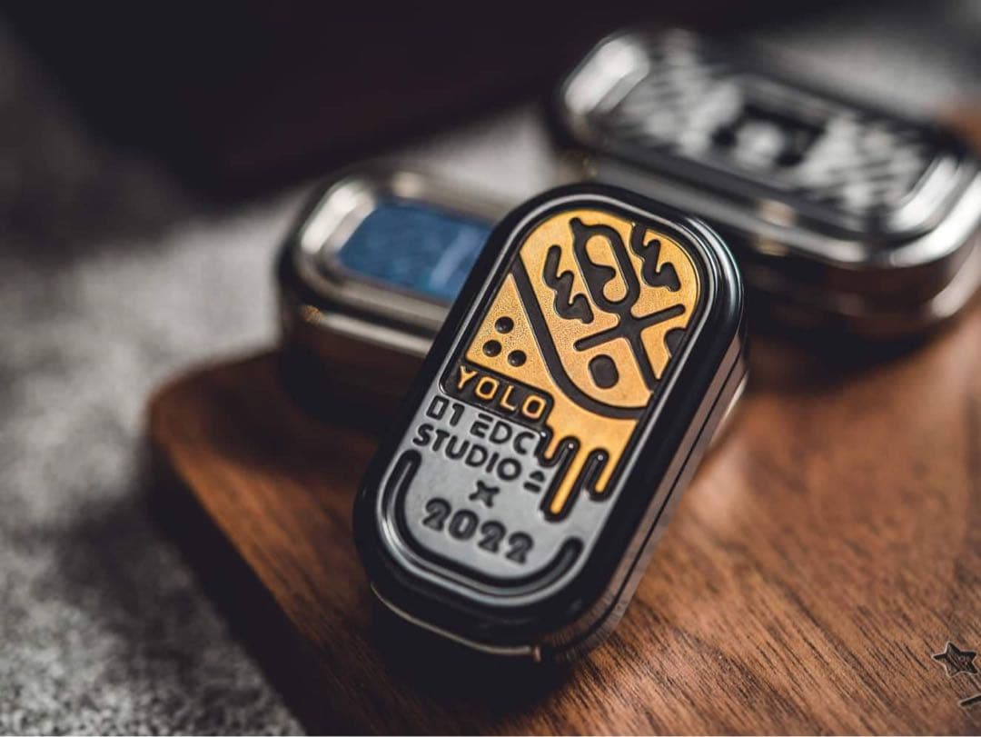 01EDCxYOLO Zirc/Brass Slider フィジェットトイ