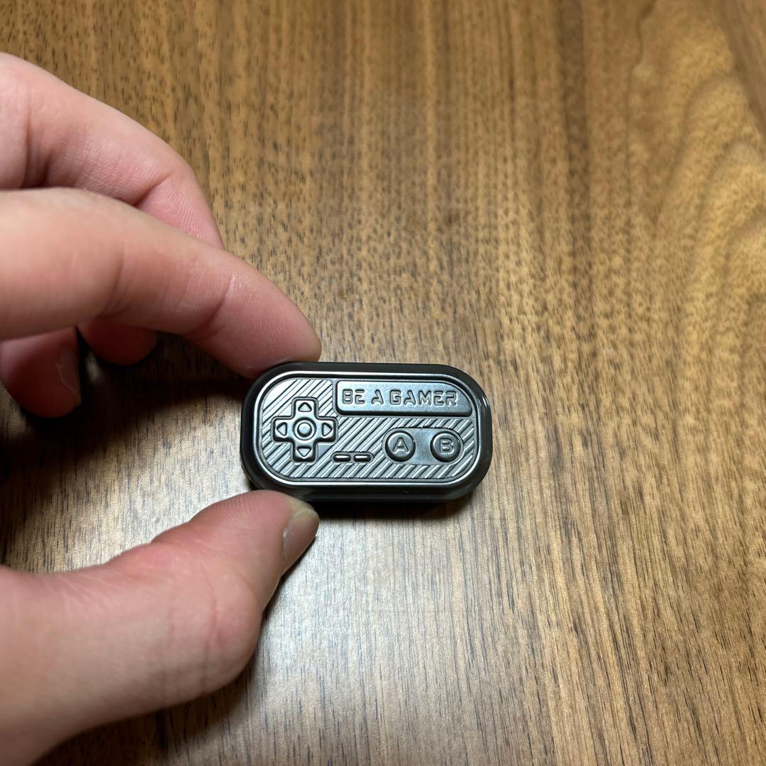 01EDCxYOLO Zirc/Brass Slider フィジェットトイ