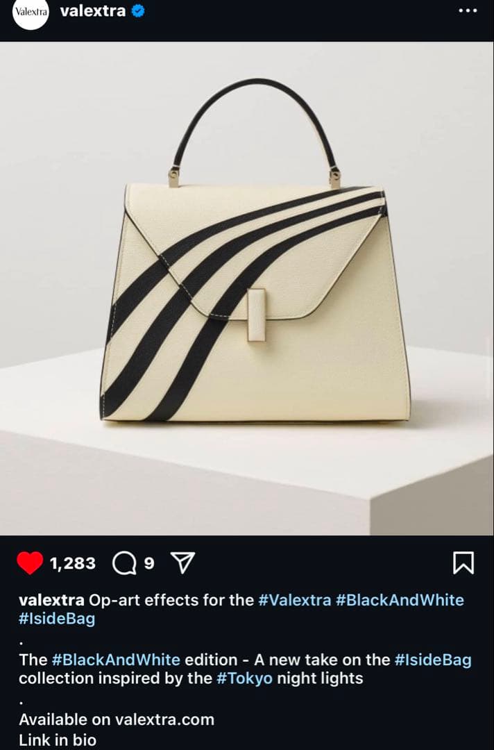 V alextra エレガントなアイボリーとブラックのハンドバッグ