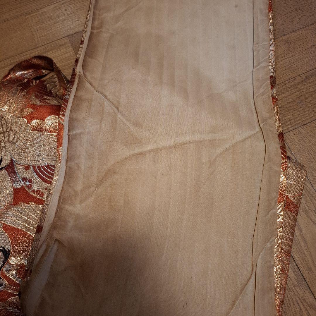 オレンジ色の鶴模様の袋つき　　　お琴