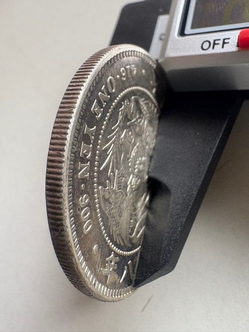 s*e様 【本物保証】　一圓銀貨　丸銀右打　明治28年銘