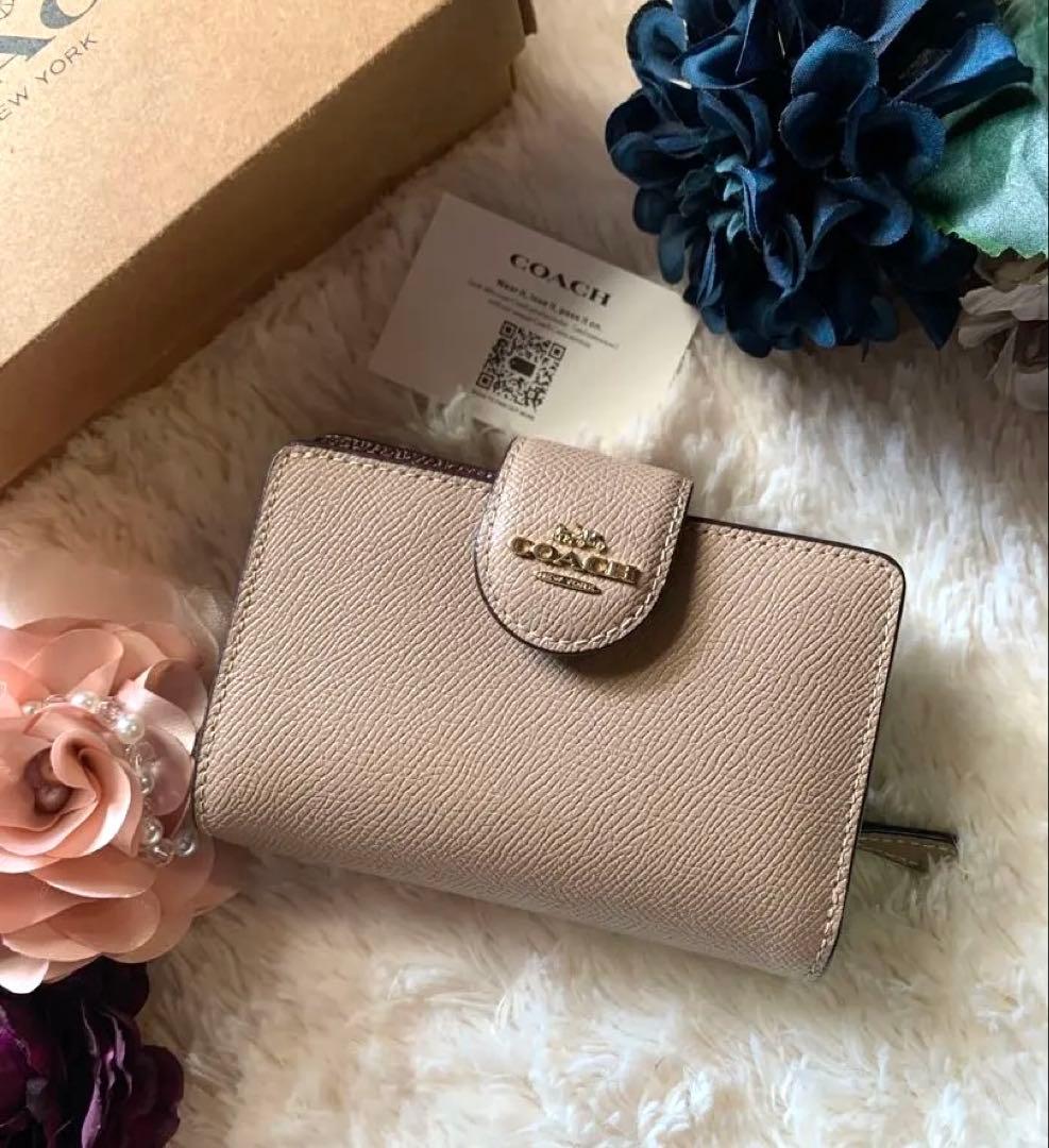 COACH ベージュ 二つ折り財布