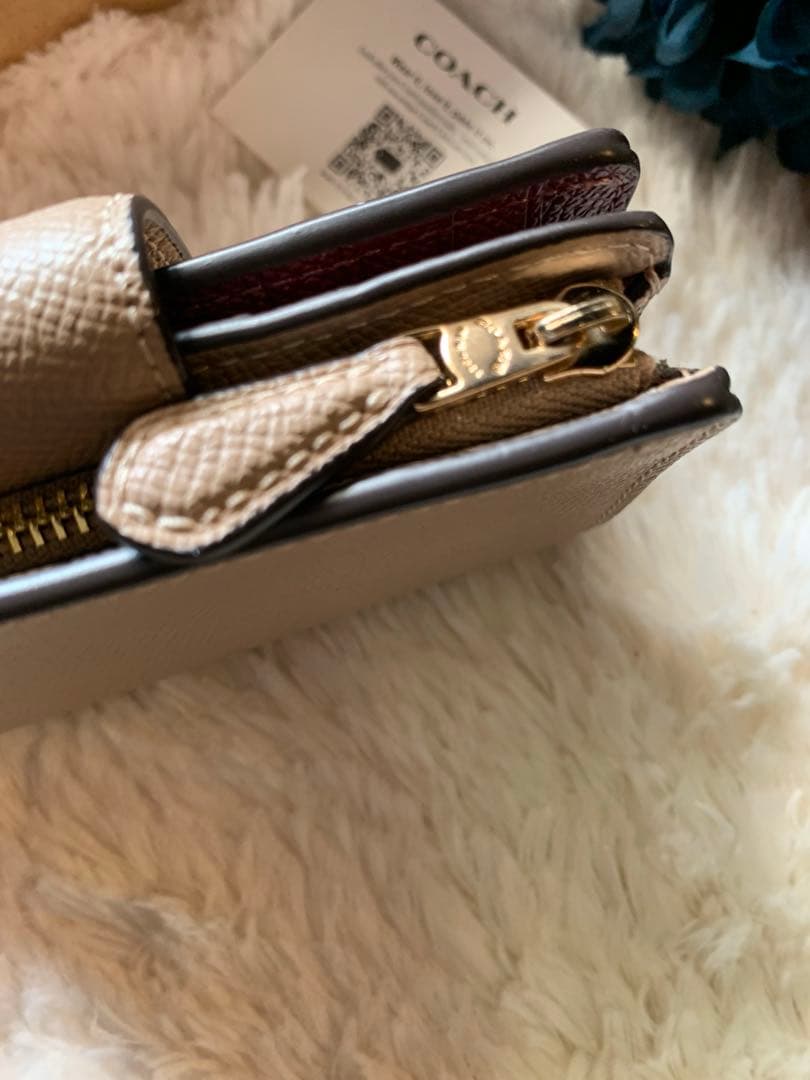 COACH ベージュ 二つ折り財布