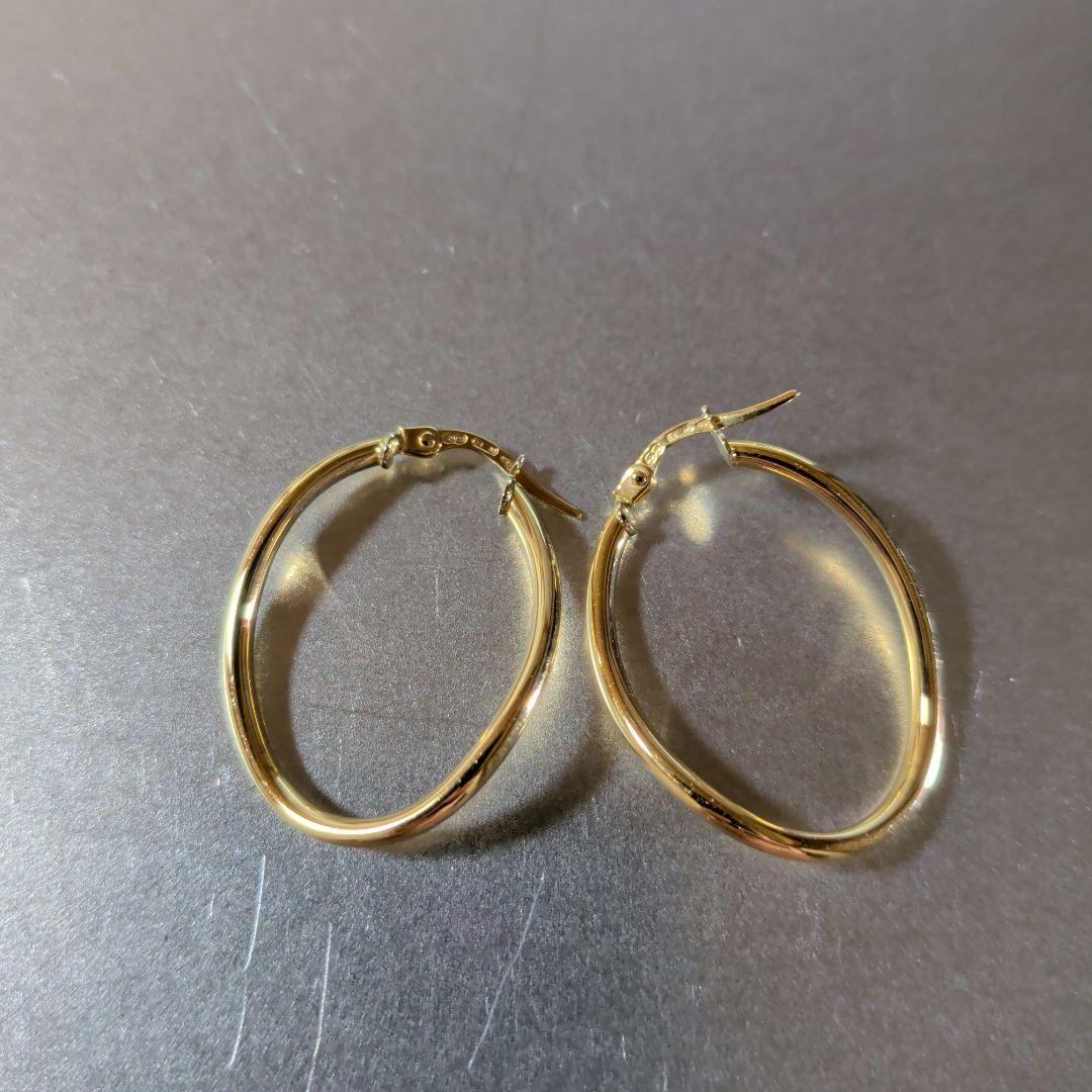 ピアス　UNOAERRE　750　YG　スナップ　ウェーブ　2.59g