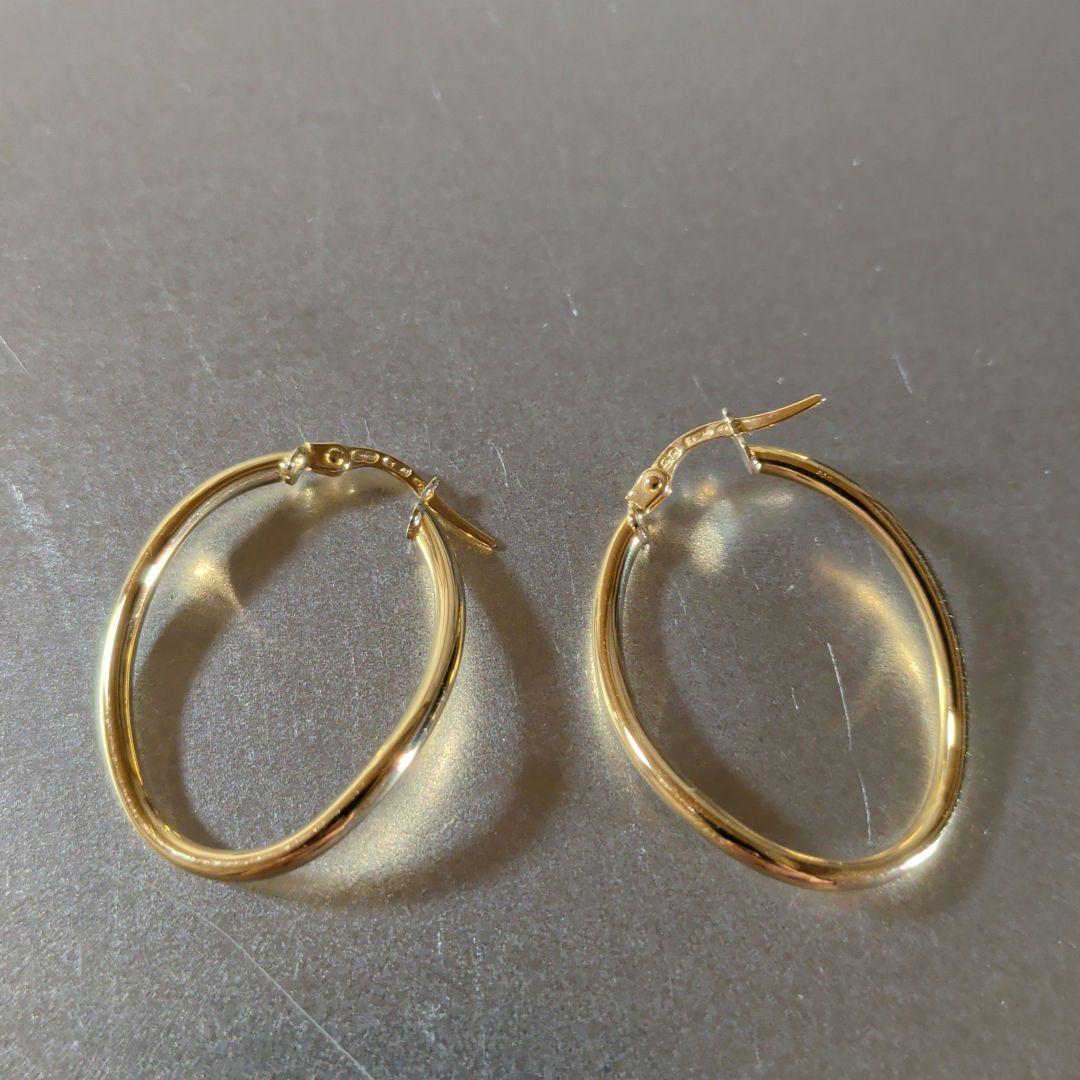 ピアス　UNOAERRE　750　YG　スナップ　ウェーブ　2.59g