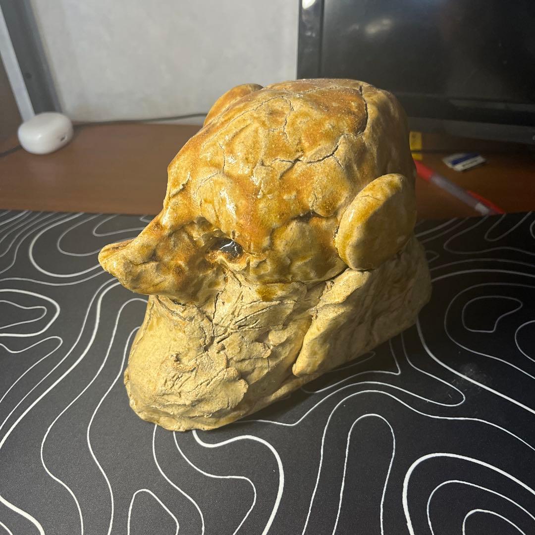 陶土製 人間と犬の顔の彫刻