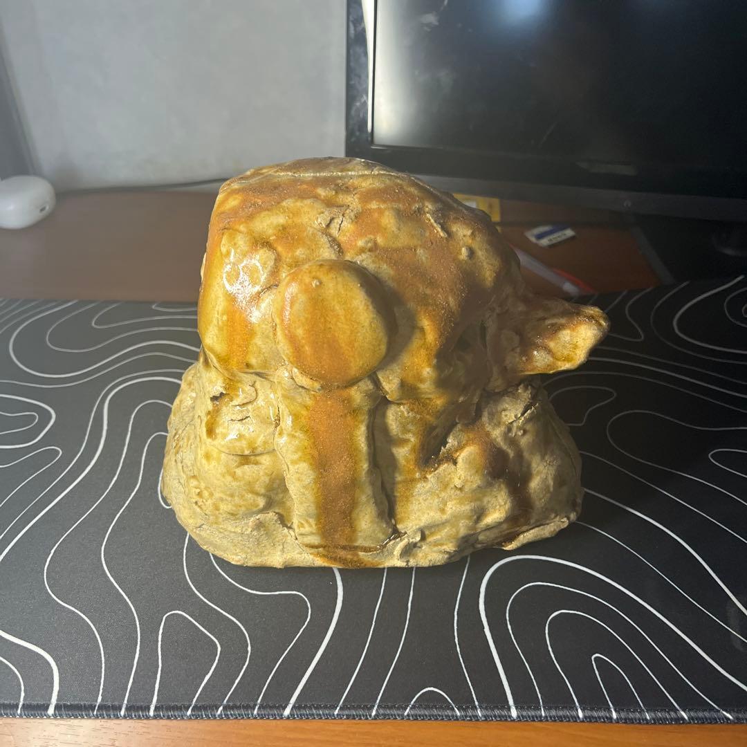 陶土製 人間と犬の顔の彫刻