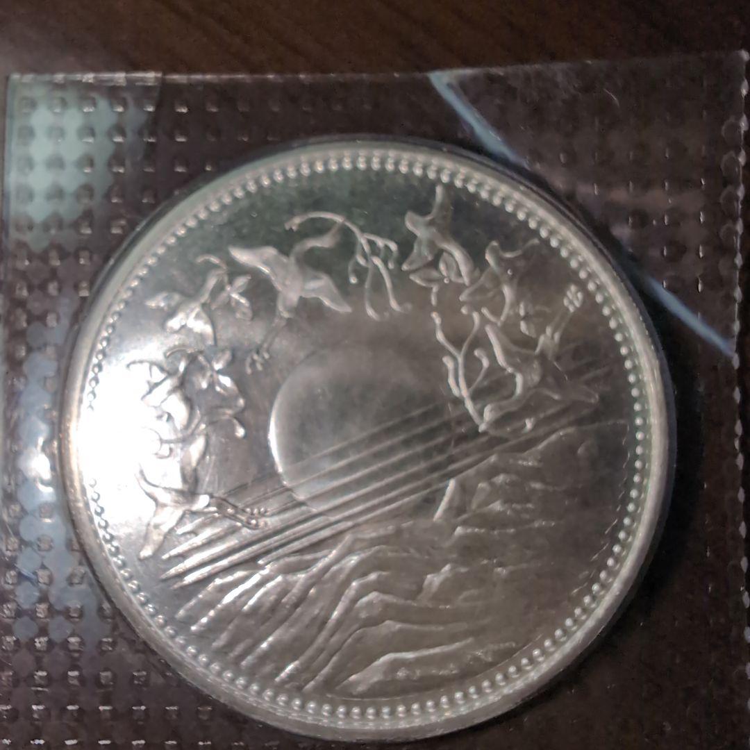 昭和61年 1万円銀貨 菊の紋章