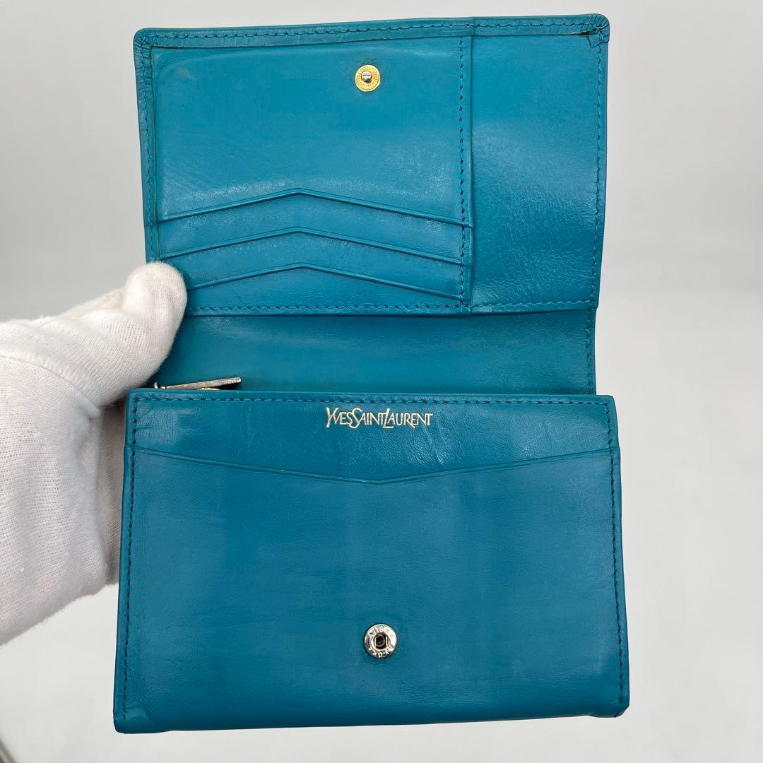 イヴサンローラン 二つ折り財布 カサンドラ YSLロゴ ライトブルー レザー