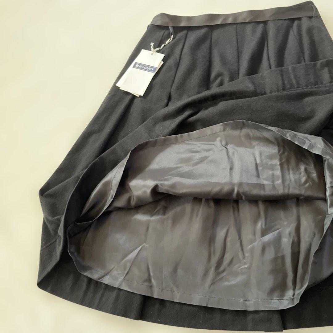 未使用タグ付き エムズグレイシー 黒スカート40 リボン付き 秋冬ウール