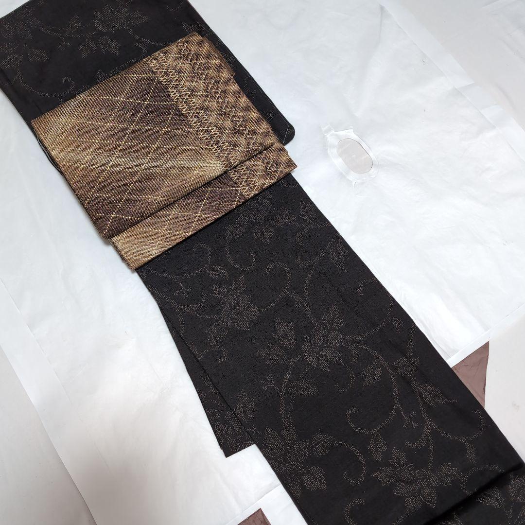 新品 未使用 正絹 袷 本場結城紬 亀甲80 泥染め 大輪花唐草 濃茶系