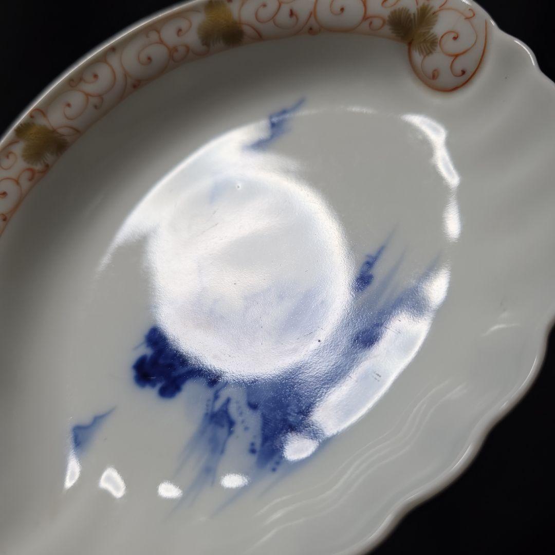 黒犬となります。金継ぎ 源六焼 富永源六 鮑型 アワビ 銘々皿 1枚