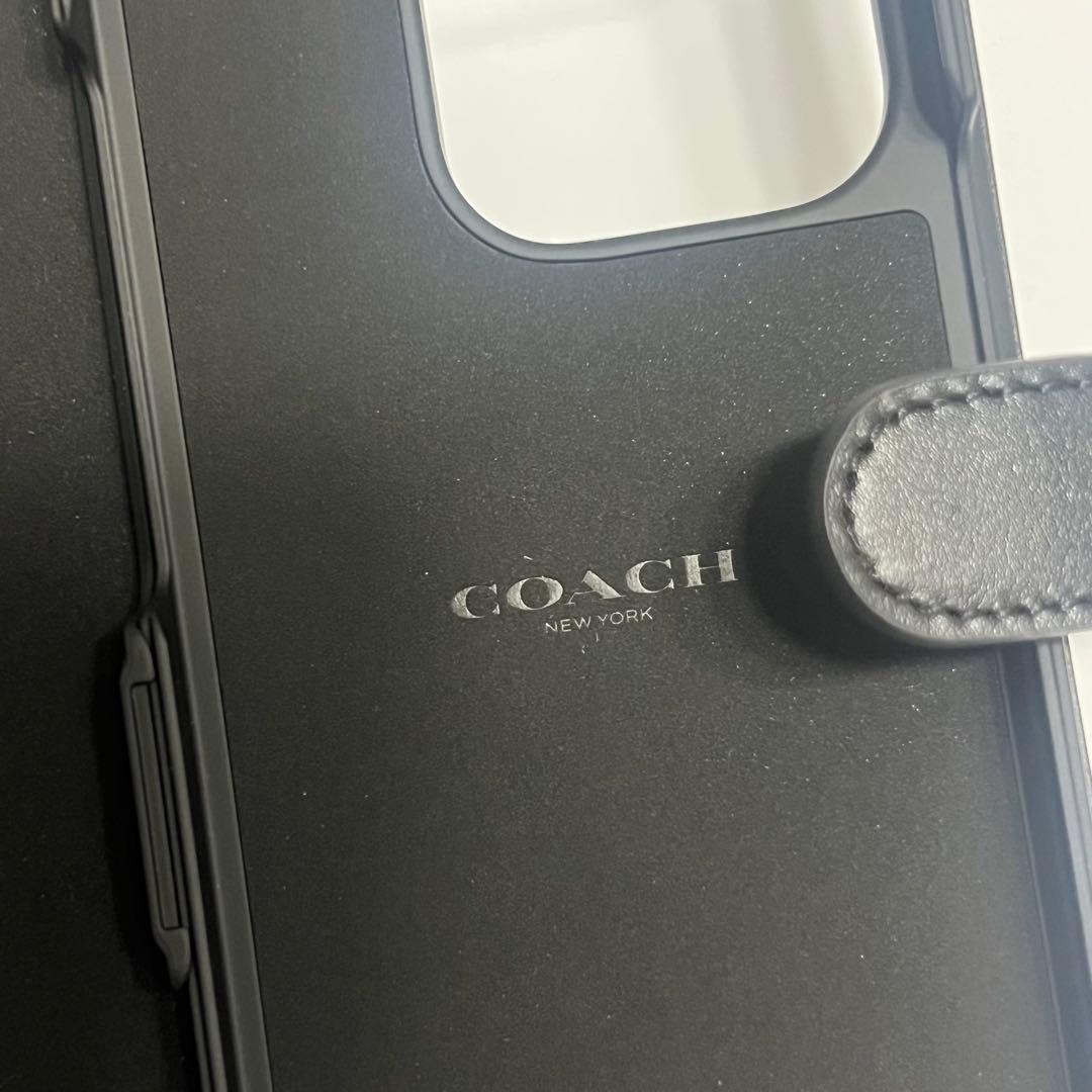 COACH iPhone14PROケース フォリオ・シグネチャー キャンバス