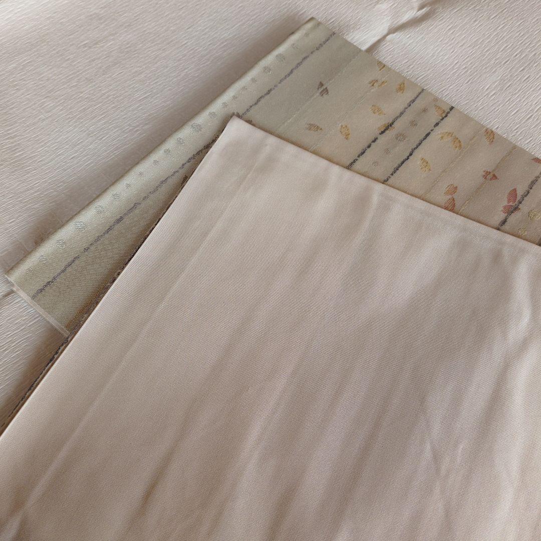 未使用　正絹袋帯　河瀬満織物　横段に花弁散らし　証紙アリ