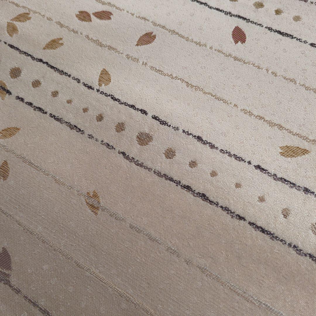 未使用　正絹袋帯　河瀬満織物　横段に花弁散らし　証紙アリ