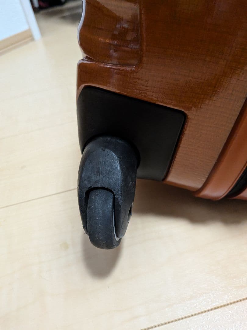 サムソナイト 波状テクスチャー キャリーケース コスモライト 4輪 オレンジ