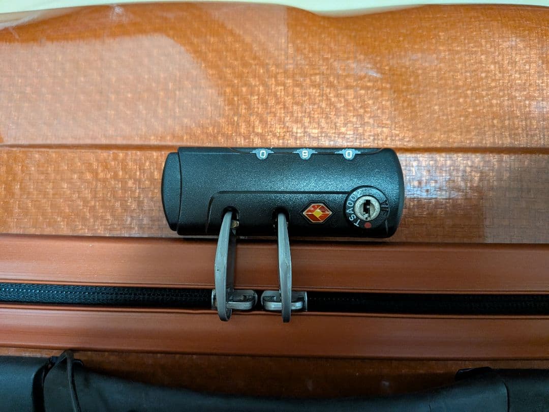 サムソナイト 波状テクスチャー キャリーケース コスモライト 4輪 オレンジ