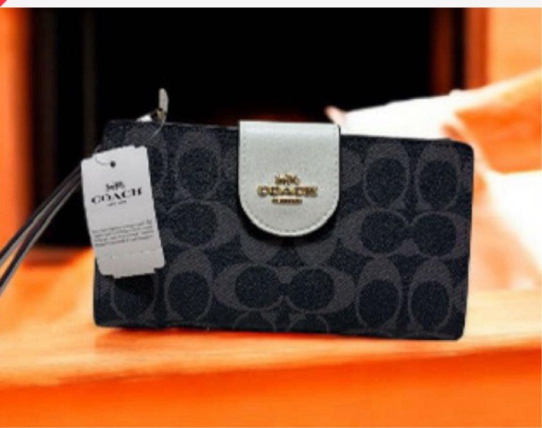 《新品》COACH 二つ折り財布