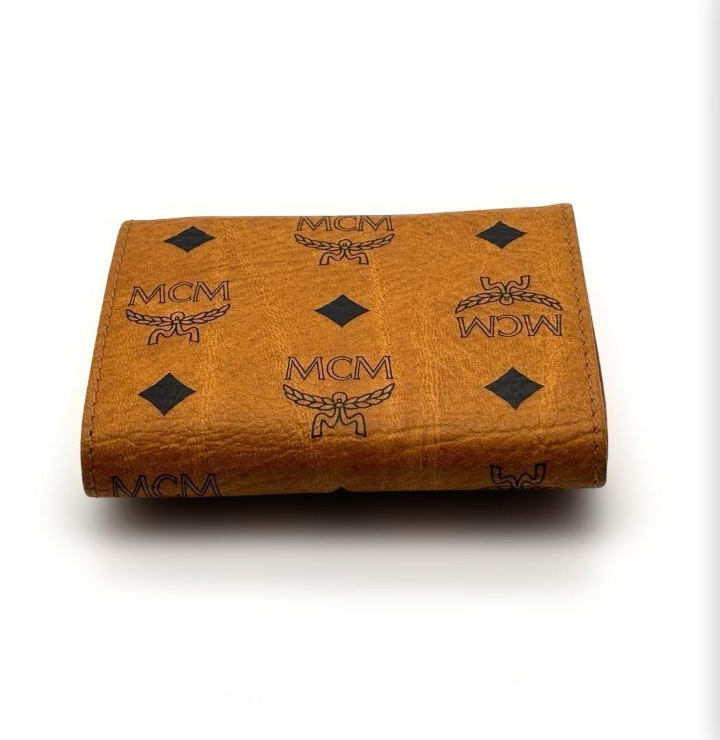 新品・未使用MCM エムシーエム 三つ折り財布 レザーブラウンロゴ入り