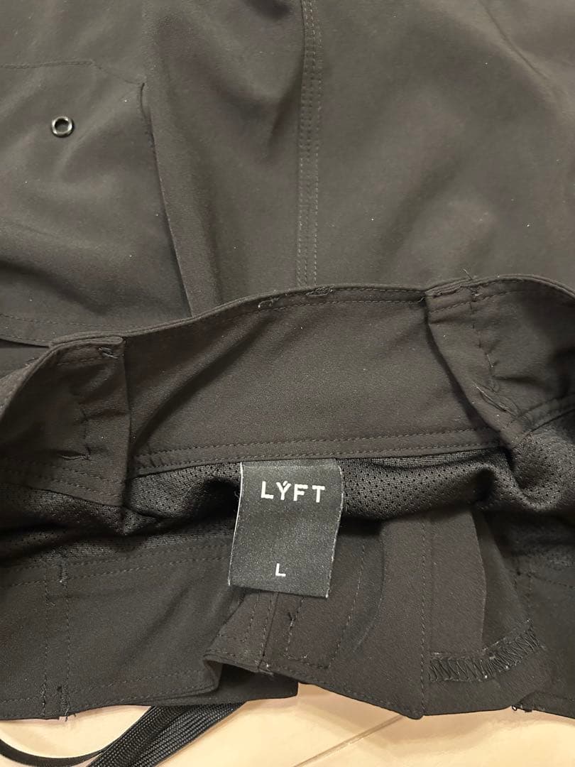 LYFT 【L】ステージショーツ　黒/オレンジ