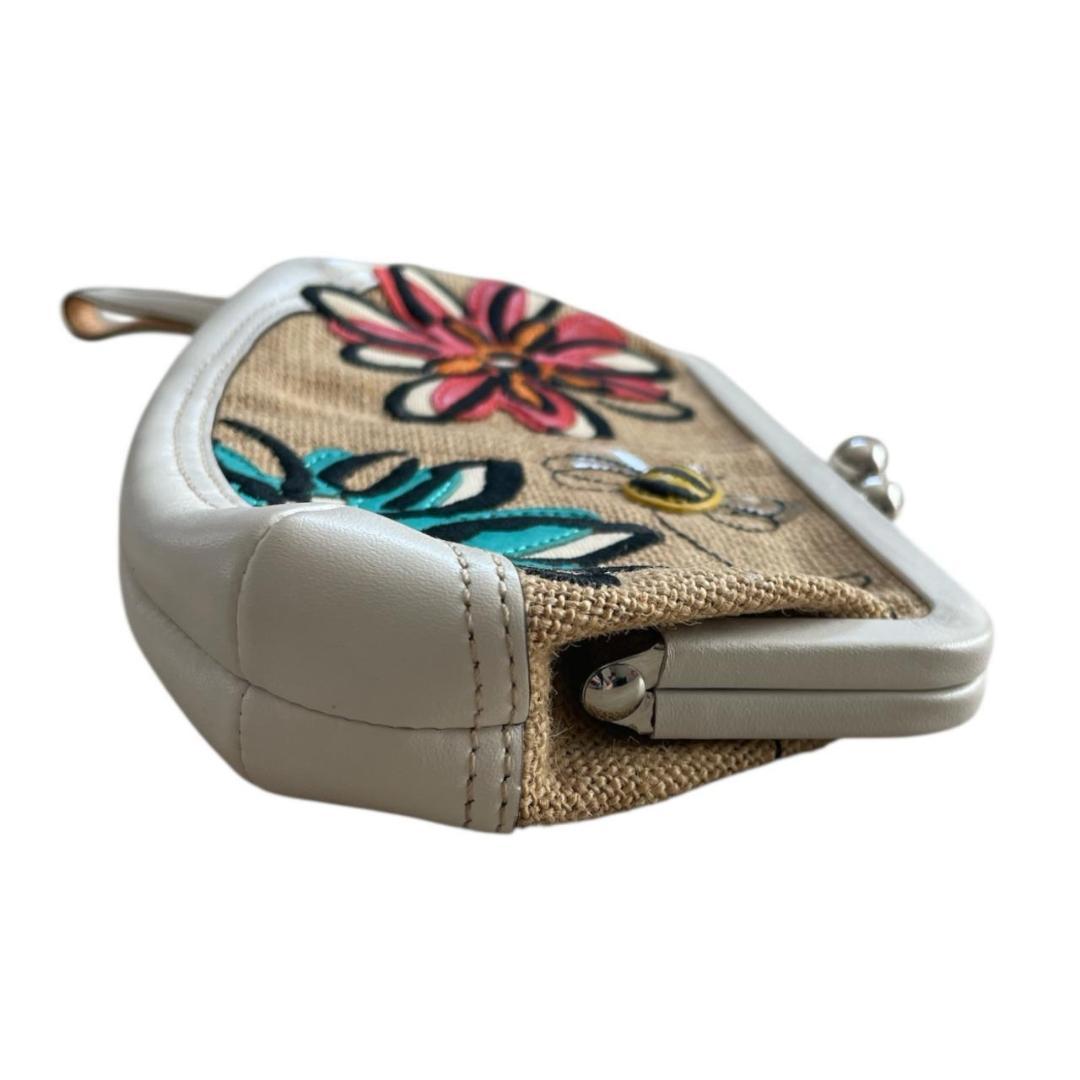 コーチ　がま口 花刺繍 蜂 キャンバス レザー ポーチ