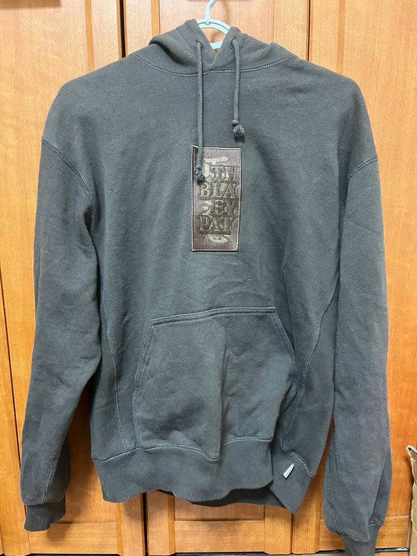 トップス HWC LABEL HOODIE DARK BROWN