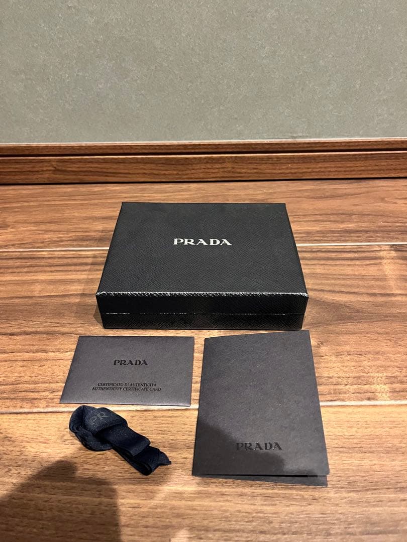 PRADA ネイビー 二つ折り財布 1M1225 サフィアーノ
