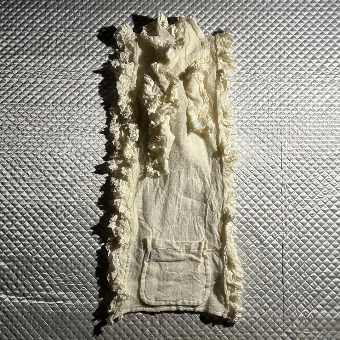 トリコ archive ウール縮絨フリルマフラー ポケット 白