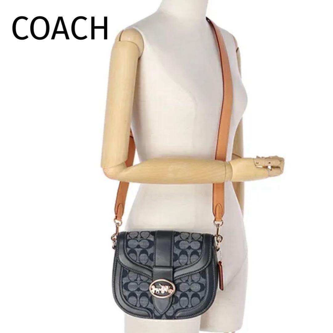 マイメロ✨コーチ ショルダーバッグ ジョージー サドルバッグ シグネチャー